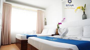 Family Quadruple Room, City View | Desk, laptop workspace, free WiFi