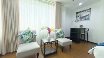 Suite | Área de sala de estar | Televisión