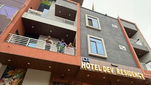 A multi-story building with balconies and a sign reading "Hotel Dev Residency". - Dev Residency NCR Wale (Danta Ramgarh)