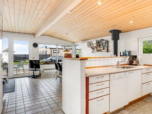 Fridge, microwave, dishwasher, cookware/dishes/utensils