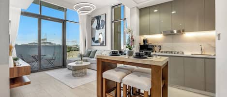 Economy Studio | Living area | 33-inch LED TV with satellite channels