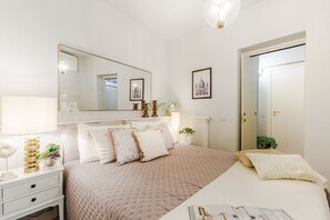 1 habitación, tabla de planchar con plancha, wifi gratis y ropa de cama 