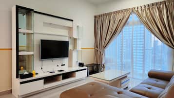 Departamento, 3 habitaciones, balcón, vista a la ciudad | Área de sala de estar