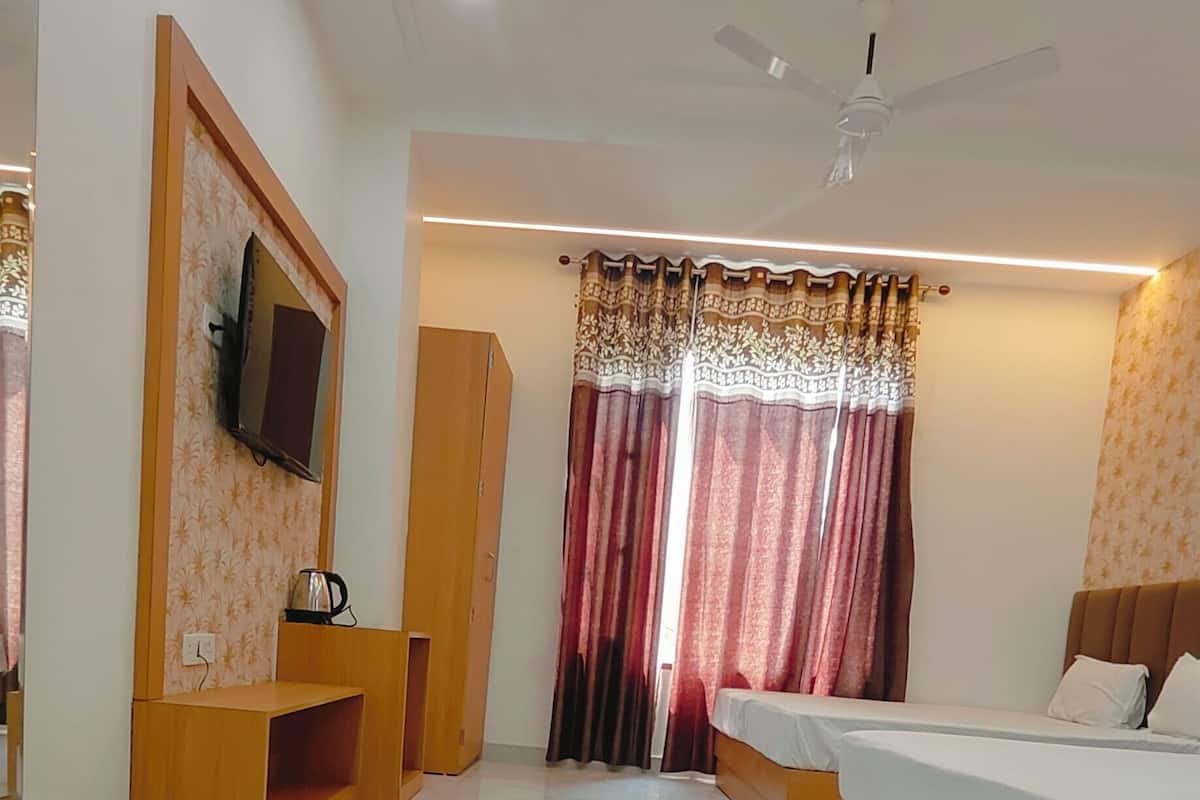 Family Suite, City View | In-room safe, desk, iron/ironing board, free WiFi