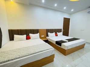Family Suite, City View | In-room safe, desk, iron/ironing board, free WiFi