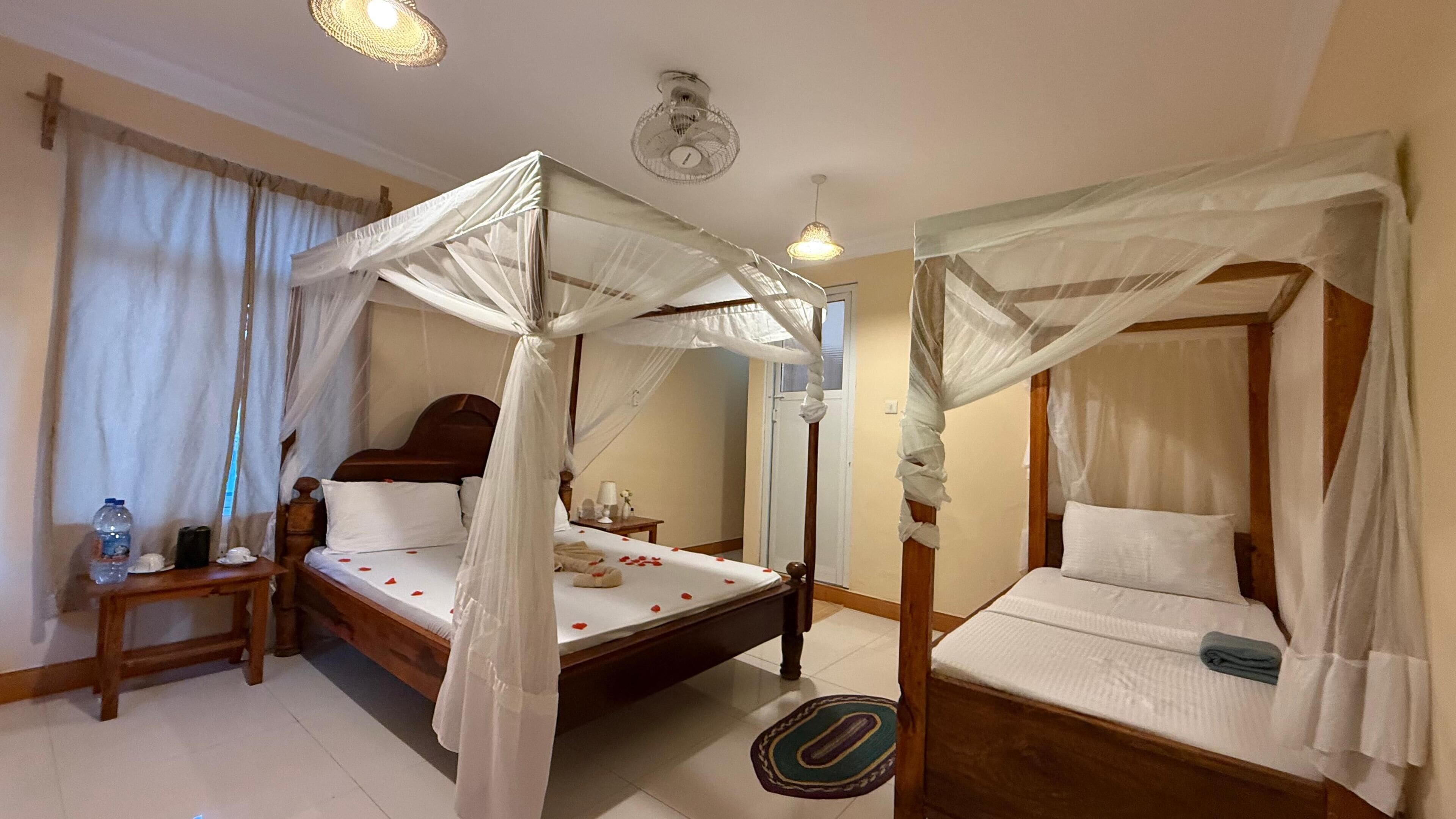 Deluxe Double Room, Balcony, Beach View | Desk, laptop workspace, free WiFi