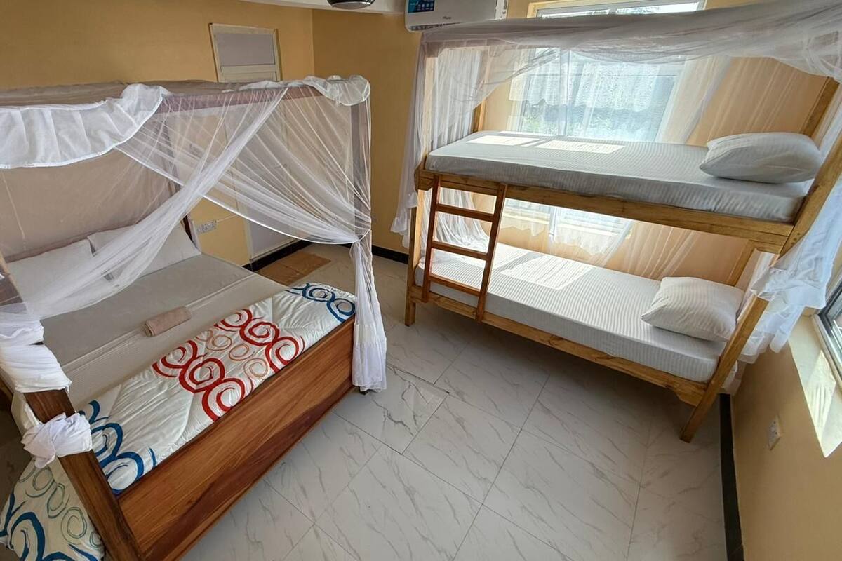 Family Room, Sea View | Desk, laptop workspace, free WiFi