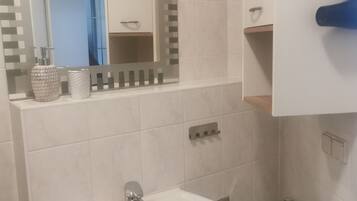 Hair dryer, towels, soap, toilet paper