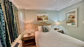 Signature Condo, 1 Bedroom, Balcony, Ocean View | Individually decorated, individually furnished, iron/ironing board
