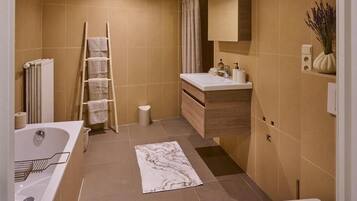 Hair dryer, towels, soap, toilet paper