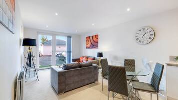 Family Apartment | Living area | 52-cm Smart TV with digital channels, Netflix, streaming services