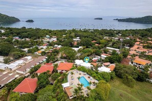 Exterior - Modern Top-Floor Condo with Panoramic Views and Community Pool (Coco)
