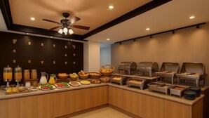 A buffet setup with various food items and beverages. - The Outdoor Kata (Karon)