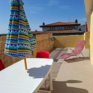 Apartamento, 2 quartos | Opções para refeição ao ar livre
