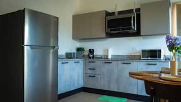Design Apartment | Private kitchen | Coffee/tea maker, dining tables