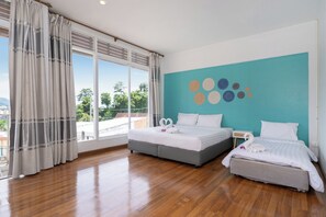 Deluxe Triple Room | Desk, free WiFi