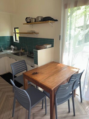 Shared Dormitory, 1 Bedroom, Patio, Garden View | Dining