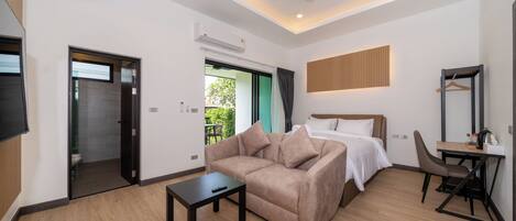 Deluxe Double Room, Garden View | Desk, laptop workspace, free WiFi