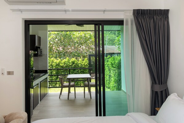 Deluxe Double Room, Garden View | Garden view - DC Residence Phuket (Chalong)