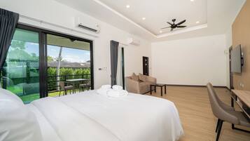 Junior Suite, Garden View | Desk, laptop workspace, free WiFi