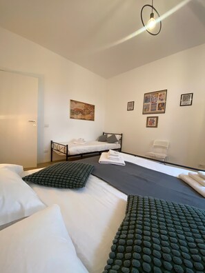 2 slaapkamers, een strijkplank/strijkijzer, gratis wifi, beddengoed