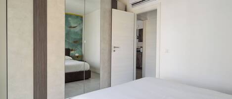 2 slaapkamers, een strijkplank/strijkijzer, gratis wifi, beddengoed