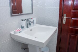 Shower, towels, soap, toilet paper