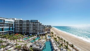 On the beach, sun-loungers, beach towels
