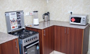 Een magnetron, een oven, een kookplaat