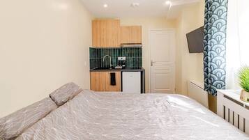 1 slaapkamer, een strijkplank/strijkijzer, wifi, beddengoed