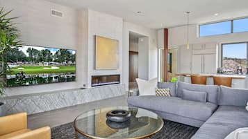 Smart TV, fireplace, books, offices