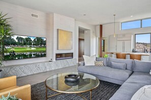 Smart TV, fireplace, books, offices