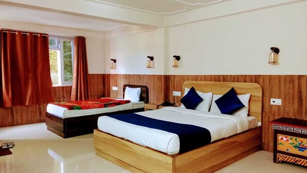 Family Quadruple Room, City View | Free WiFi, bed sheets