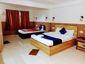 Family Quadruple Room, City View | Free WiFi, bed sheets