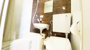 Family Apartment, Non Smoking, Kitchen | Bathroom | Combined shower/tub, deep soaking tub, hair dryer, slippers