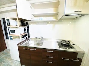 Family Apartment, Non Smoking, Kitchen | Blackout drapes, iron/ironing board, free WiFi