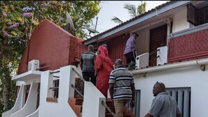 A building with a staircase leading to a second floor. - Kiota Jungle Homestay (Dar es Salaam)