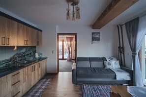 Apartament typu Deluxe z balkonem i widokiem na góry | Wohnbereich