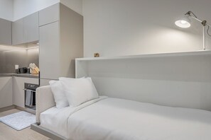 1 bedroom, desk, iron/ironing board, travel cot