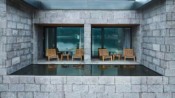 Habitación doble de lujo, vista al mar | Terraza o patio