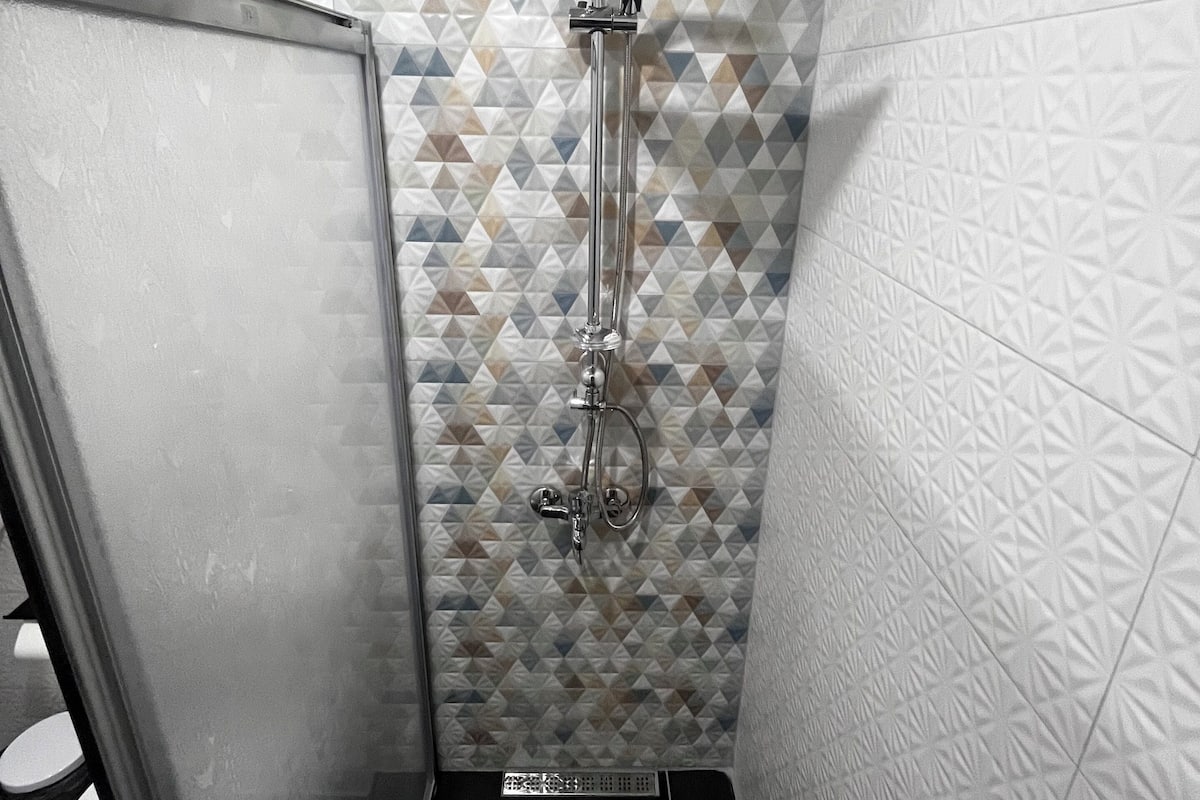 Economy Double or Twin Room, Balcony | Bathroom | Shower, hair dryer, towels, soap