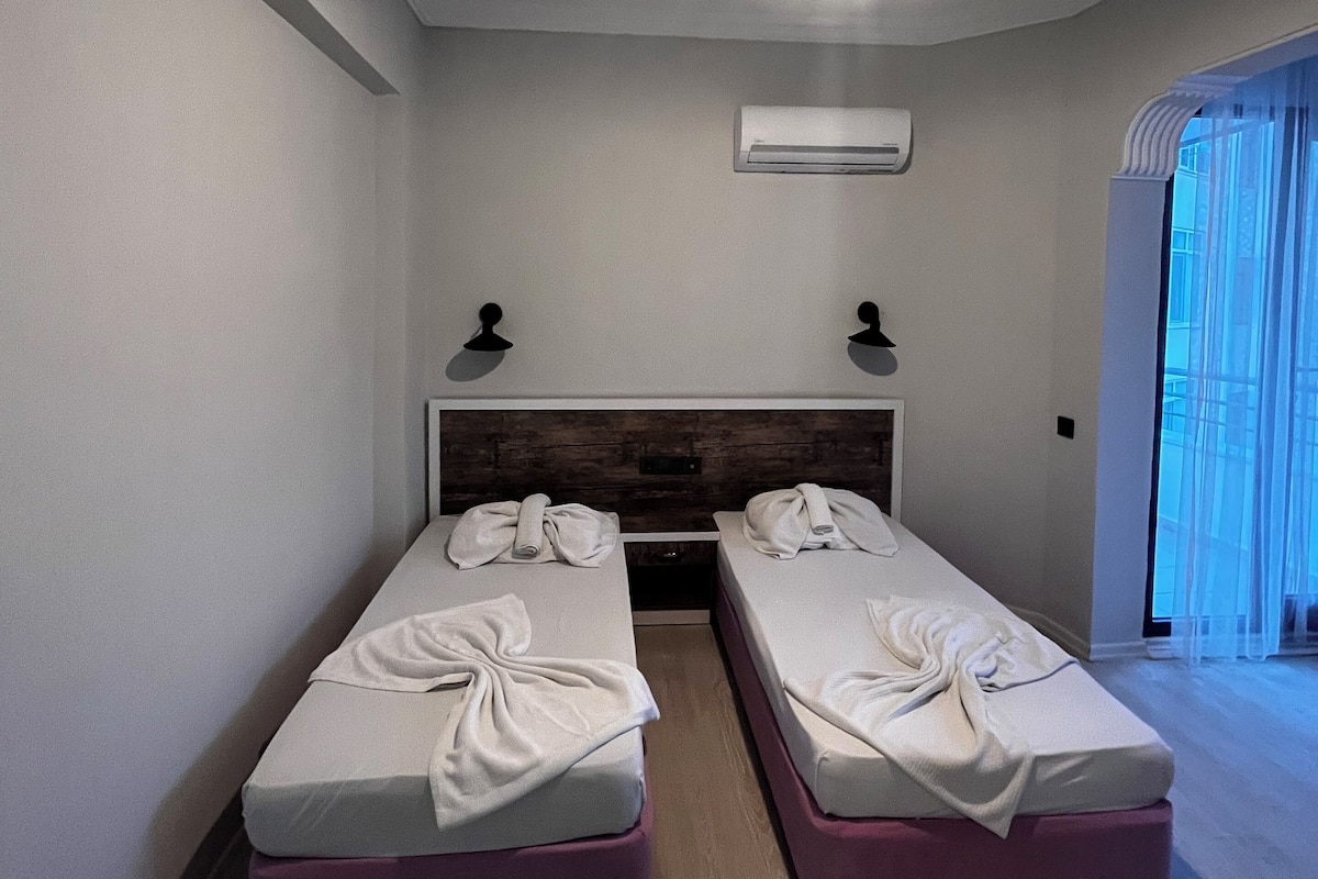 Economy Twin Room, Balcony, Partial Sea View | Free WiFi
