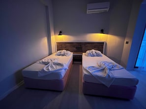 Economy Twin Room, Balcony, Partial Sea View | Free WiFi