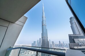 A view of the Burj Khalifa from a high-rise building, showcasing the city's skyline. - 4BR High-Rise Burj & Fountain View (Dubai)