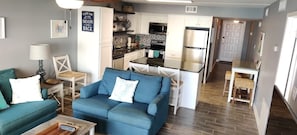 Condo, 2 chambres | Aire de séjour