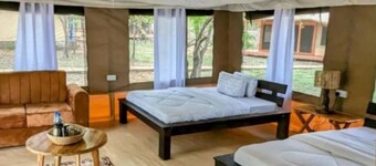 Double G safaris and Camp Mikumi - Luxury Triple Room