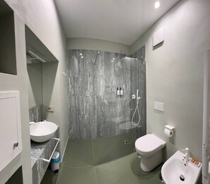 Standard Room | Bathroom | Hair dryer, slippers, towels, soap