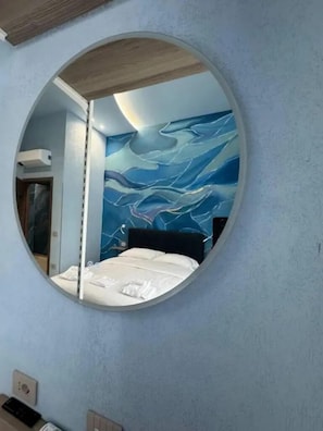 Deluxe Room, Balcony, City View | In-room safe, desk, iron/ironing board, free WiFi