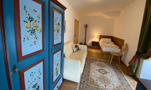 Deluxe Quadruple Room, Mountain View | In-room safe, desk, soundproofing, free WiFi