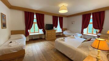 Deluxe Quadruple Room, Mountain View | In-room safe, desk, soundproofing, free cribs/infant beds